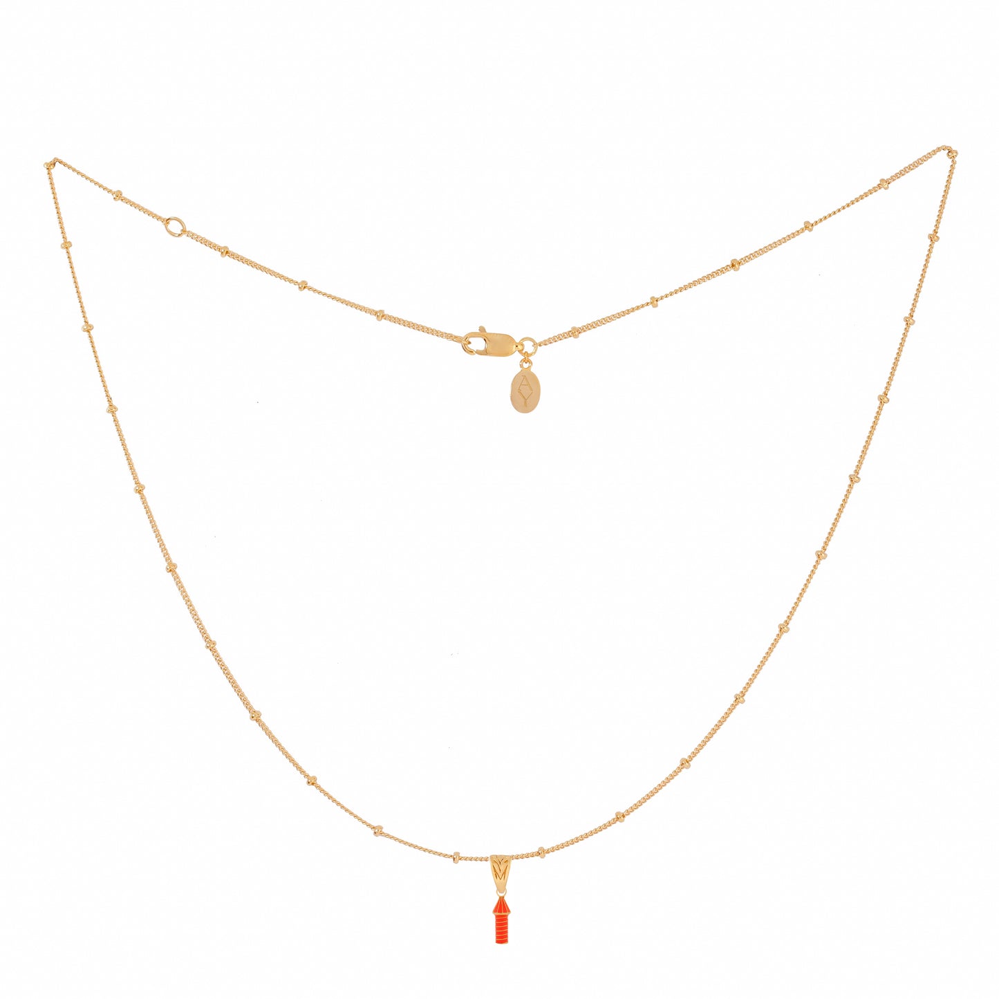 image of rocket enamel necklace showing full length ball chain and pendant on white background