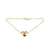 Gold chain bracelet with heart motif 