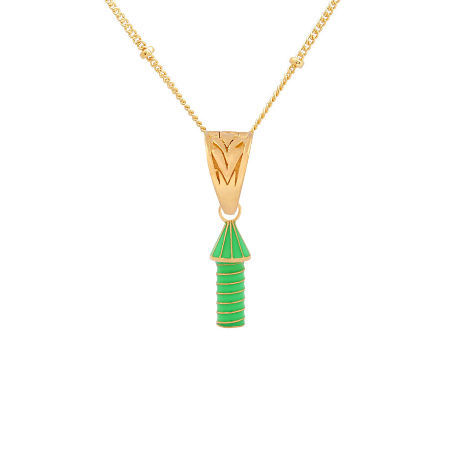 image of rocket enamel necklace in green close up view on white background