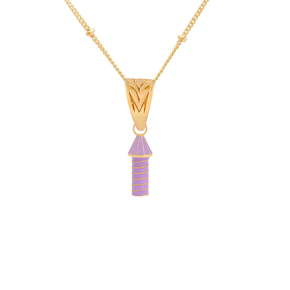 image of rocket enamel necklace in purple close up on white background