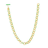 image of spark gold chain necklace in green and gold showing full length curved lying flat on white background