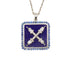 A necklace with a square pendant featuring a silver emblem on a lapis lazuli background, surrounded by blue sapphires, and a chain attached to the top.