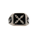 A signet ring with a black onyx emblem in recycled sterling silver, featuring a emblem depicting two hands on columns.