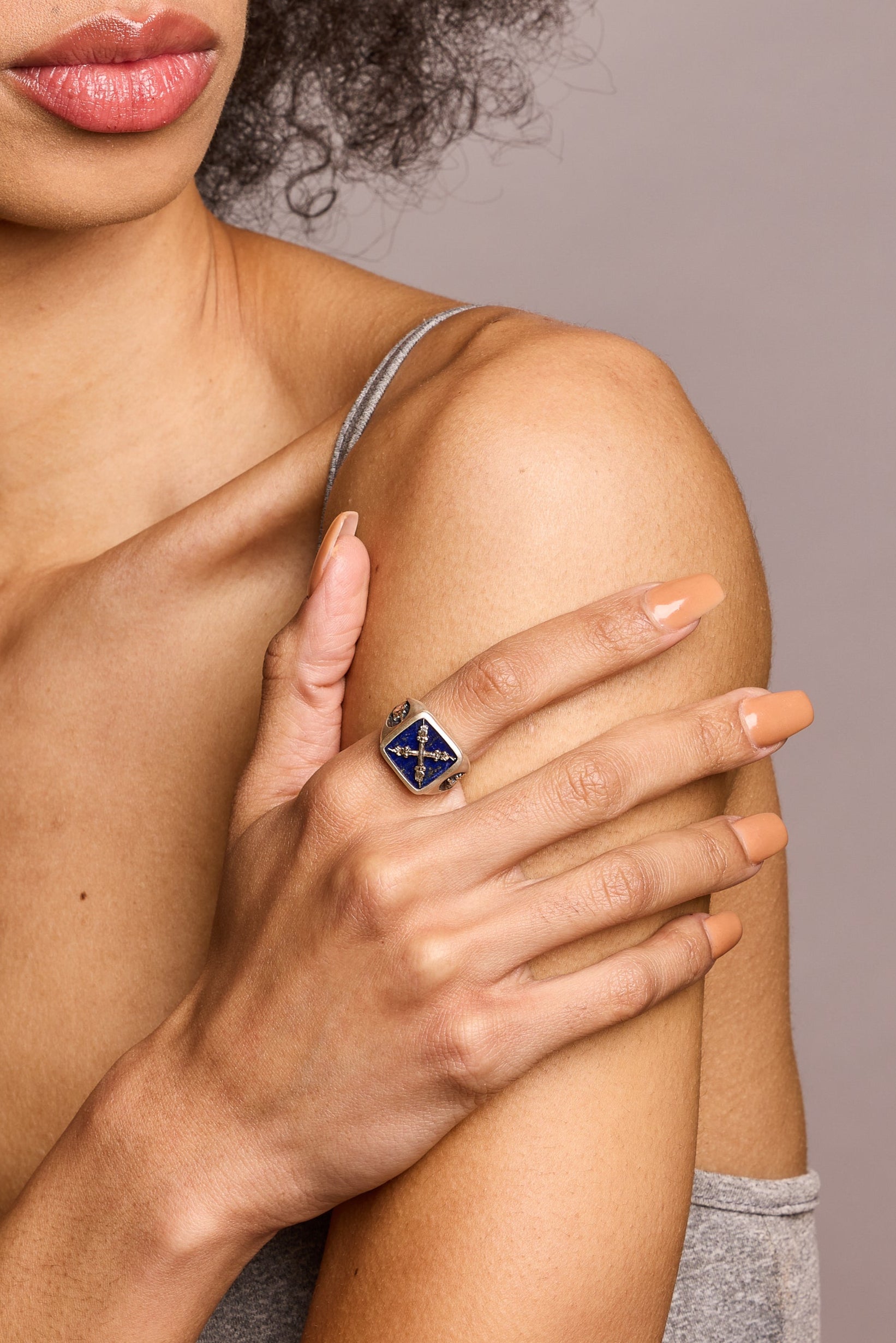 Lapis Introvert Signet Ring in silver on model holding arm with hand