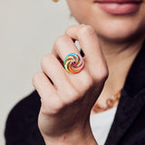 image of spinning ring on model with closed hand in forefront