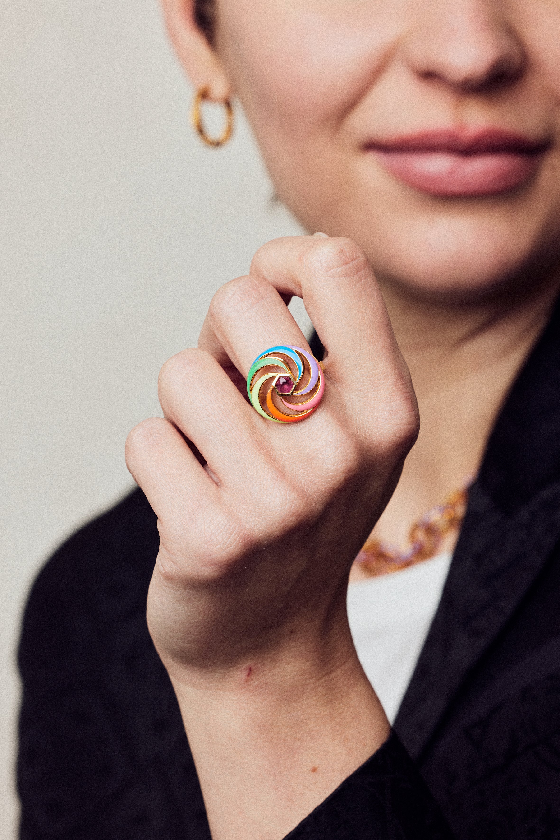 image of spinning ring on model with closed hand in forefront