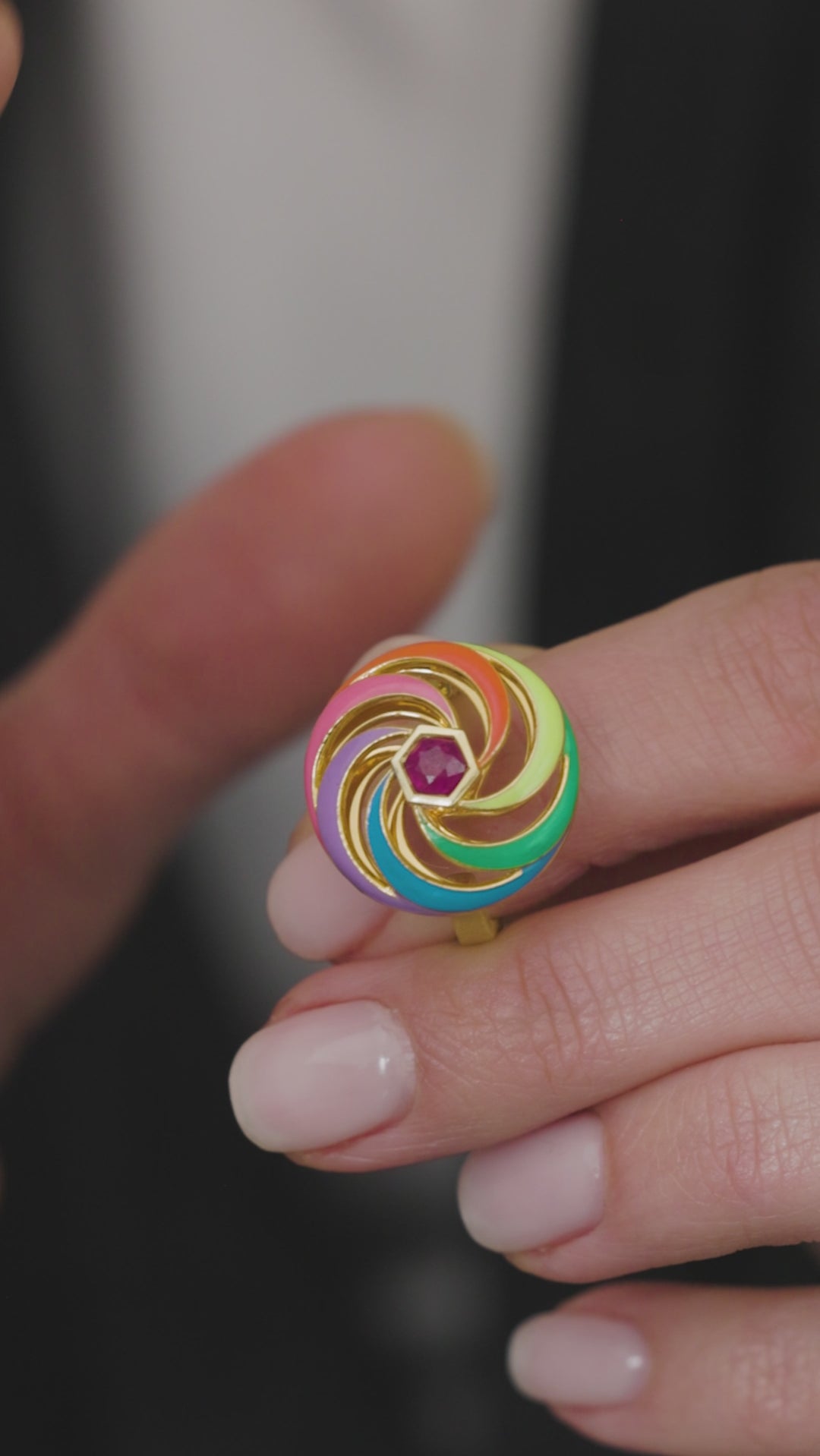 video of spinning ring in slow motion being spun close up with hands