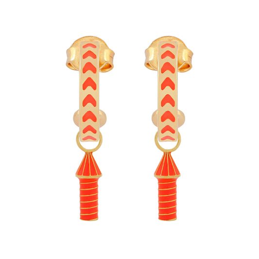 image of rocket enamel earrings in orange and gold on white background