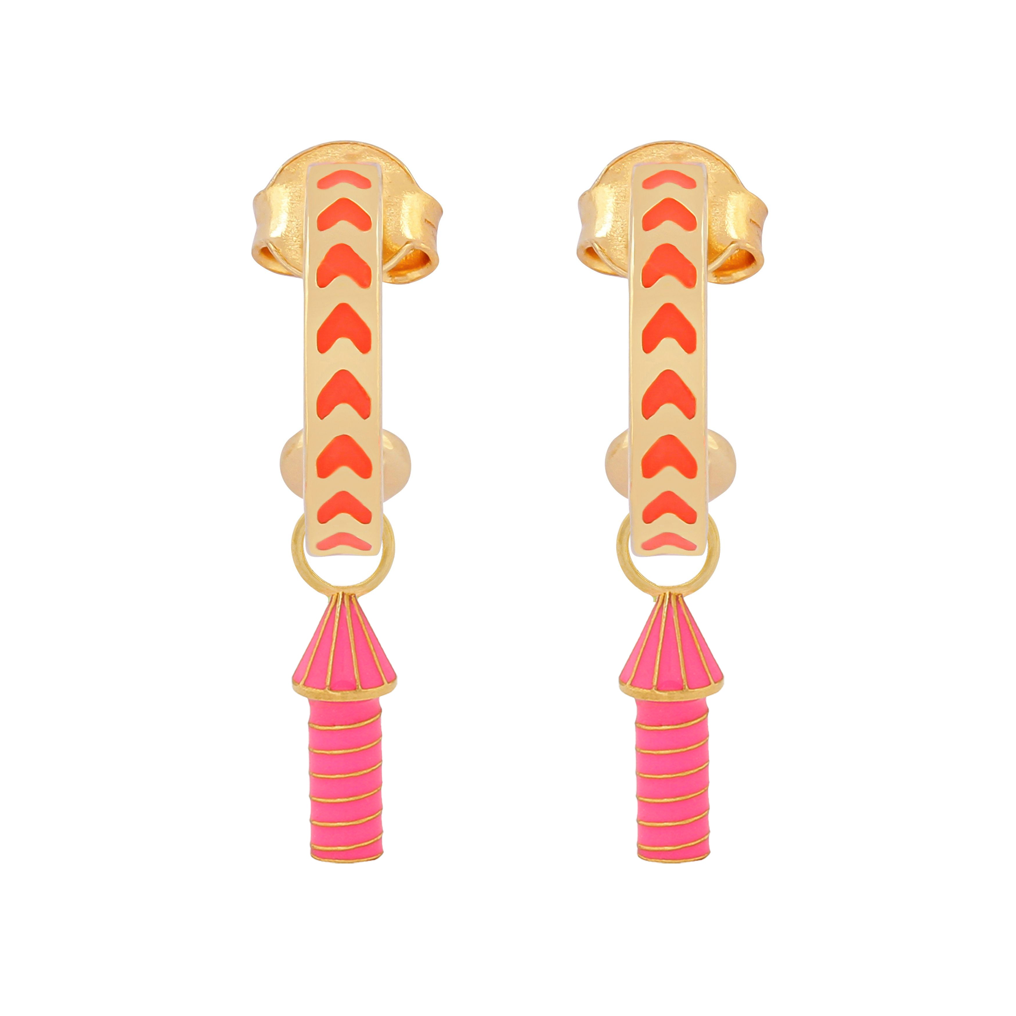 image of rocket enamel earrings in orange and pink and gold on white background