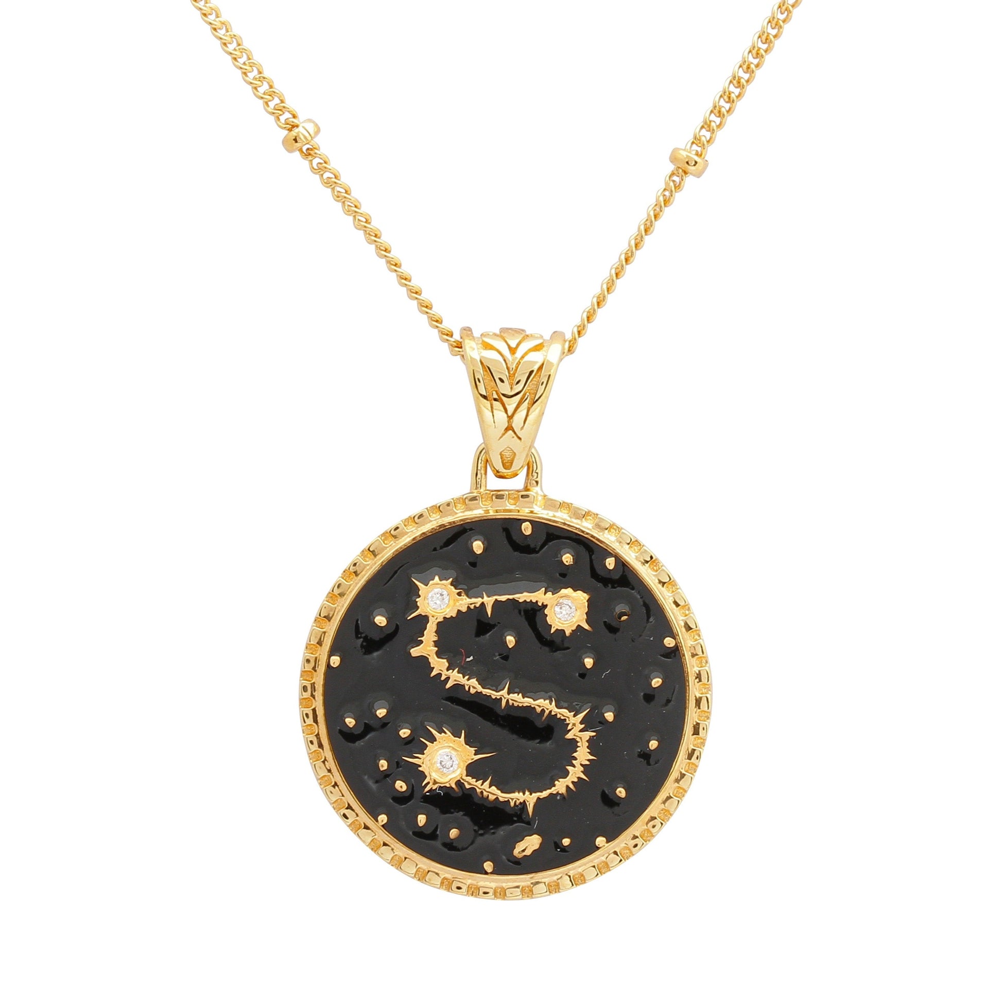 image of sparkler diamond initial necklace in black and gold, letter S, close-up of pendant on white background