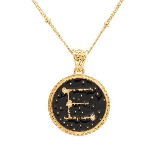 image of Sparkler Diamond Initial Necklace, letter E, in black and gold, close up of pendant on white background