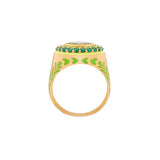 image of firework statement ring in green and gold view flat from above on a white background