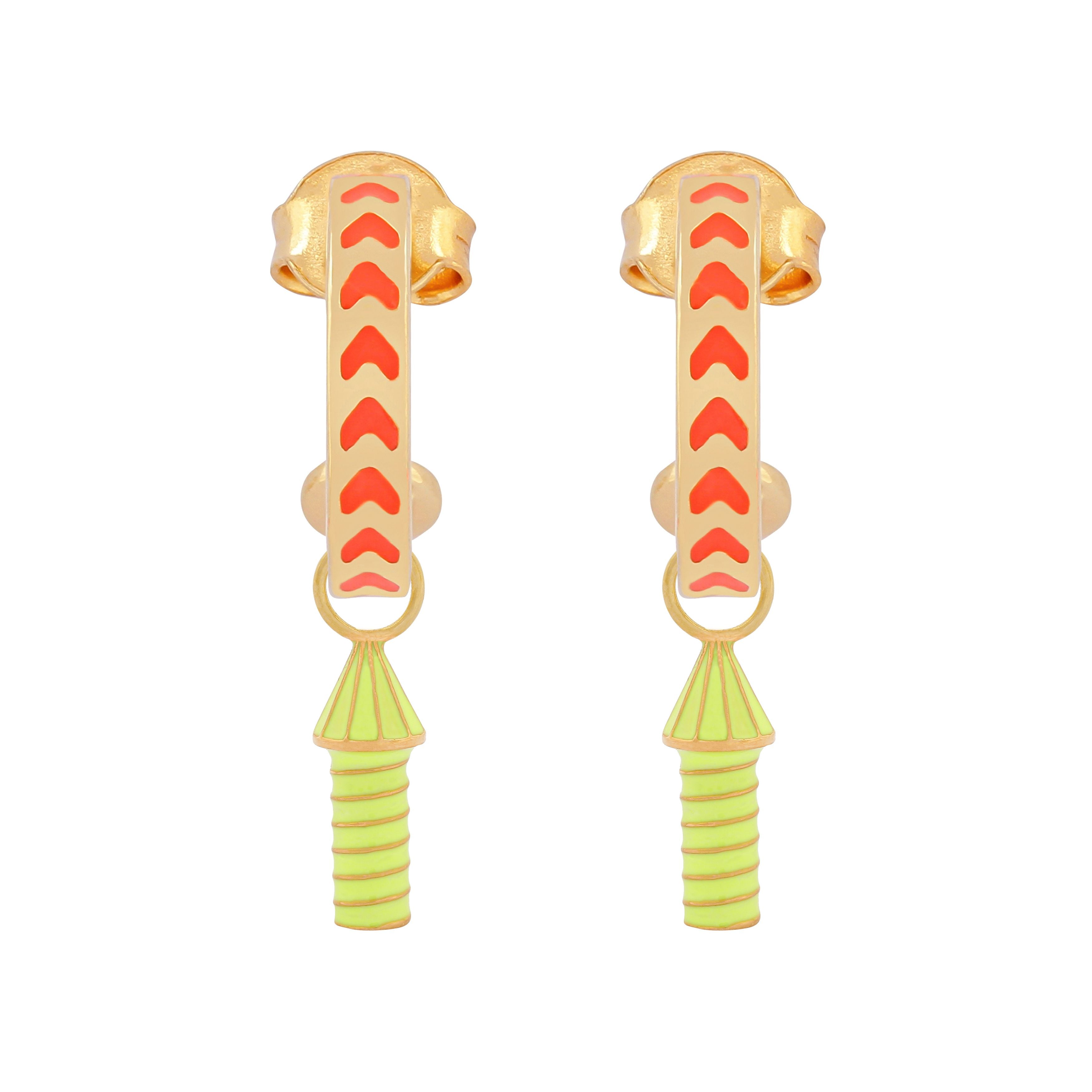 image of rocket enamel earrings in orange and neon yellow and gold on white background