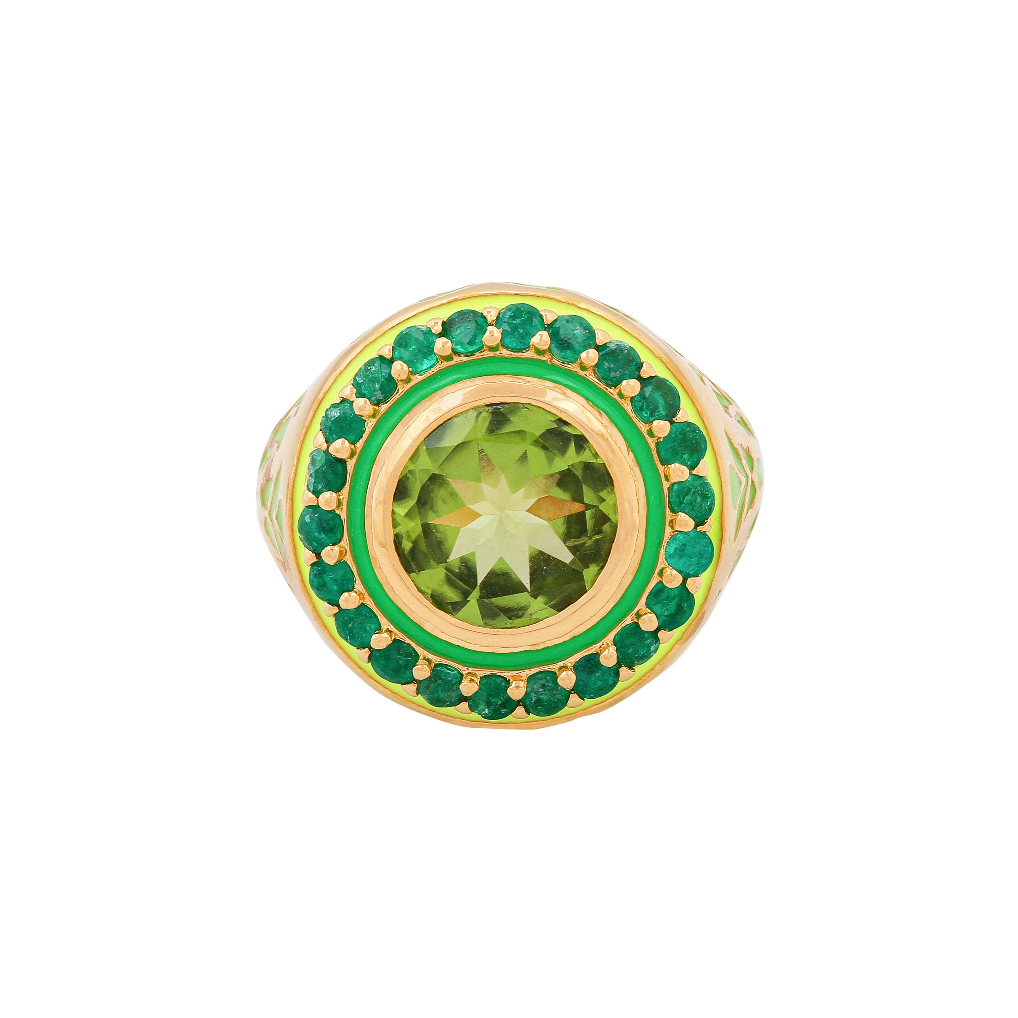 image of firework statment ring in greena and gold, face on, on a white background
