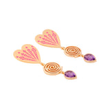 image of firework heart earrings in pink, purple and gold lying down on white background